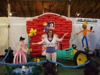 Janice showing off the finished sculpture at the Genesee County Fair